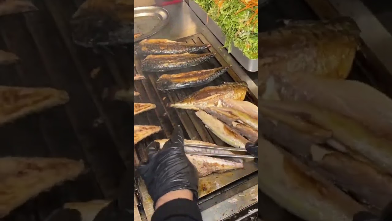 Skilled hands separate fish bones from grilled fillets with clean precisin 