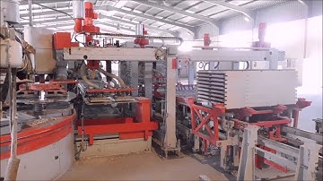 OCEM press OPA740 producing 4 x 333x333mm double-layer tiles + tiles finishing line