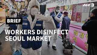 Disinfection at Seoul's local market as virus spreads in South Korea | AFP