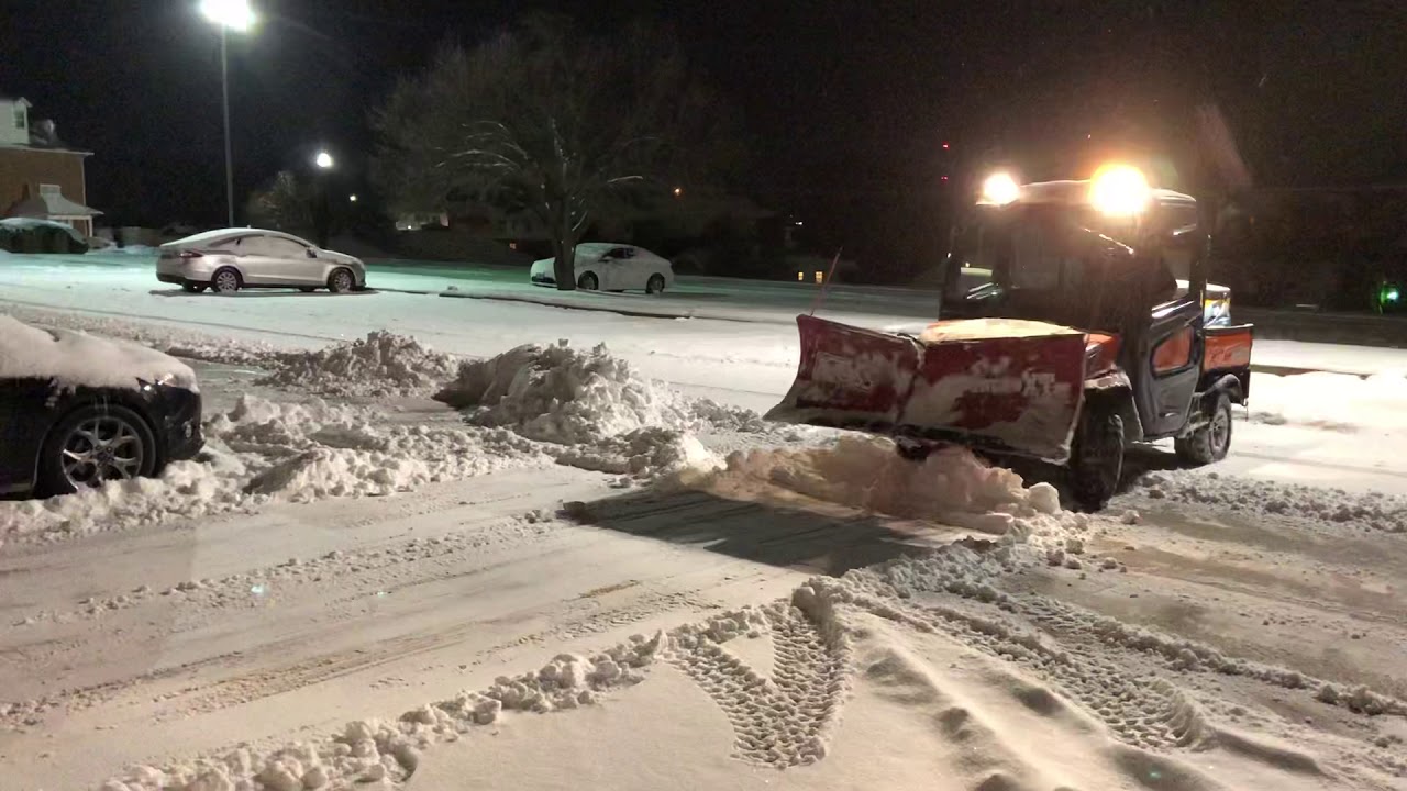 Kubota rtv 1100 plowing snow YouTube