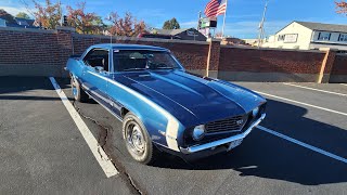 People leaving the carshow on Bancroft Ave