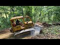 Building logging roads to access timber on steep ground