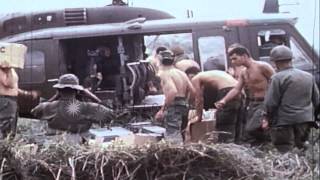 Supplies unloaded from UH-1D helicopter by American troops during the Vietnam War HD Stock Footage