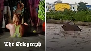 Typhoon Doksuri: House swept away by raging river in Philippines