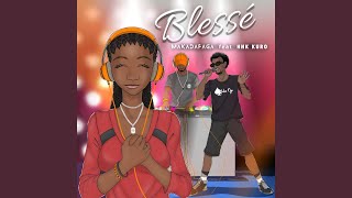 Blessé