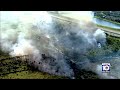 Crews battle grass fire in southwest Miami-Dade