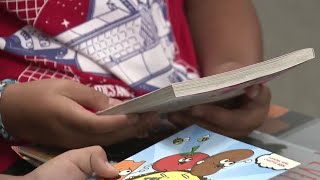 Students at Boone Elementary raise money for new books, also give to neighboring middle school