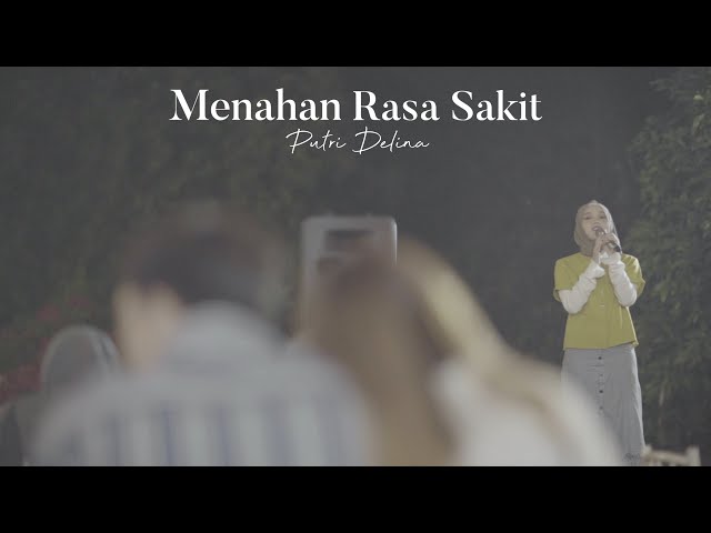 Putri Delina - Menahan Rasa Sakit [Official Music Video] class=
