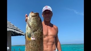 Shirtless Tim McGraw Shows Off His Ripped Abs At 52