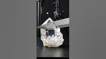 Super-sharp knife slices obsidian, quartz, sapphire, emerald—showing real cleavages, facets, and fra