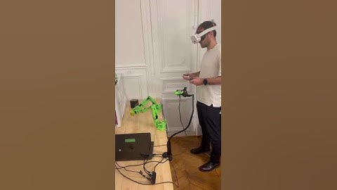 Bimanual control with Meta Quest of SO-100 AI robot arm