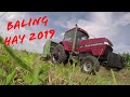 Baling Hay 2019 with a 7120 Magnum and JD 435