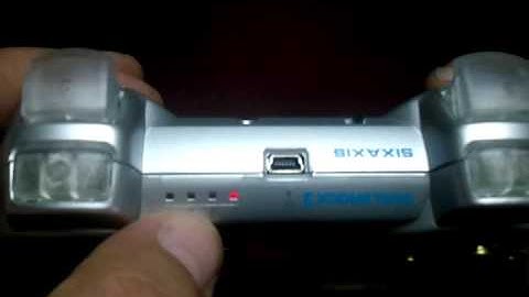 silver Dualshock 3 with bullet buttons