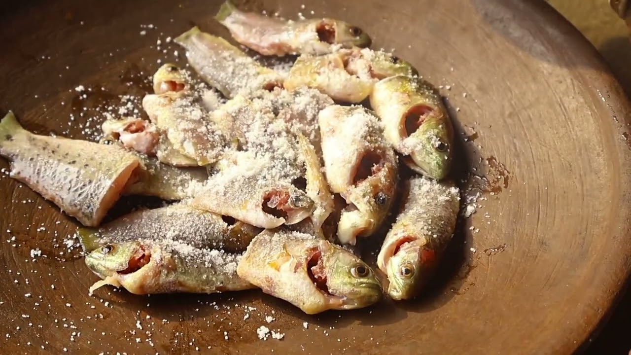 ⁣Koi fish Recipe  With kochu | village style cooking fish #tribecooking #cooking #villagecooking