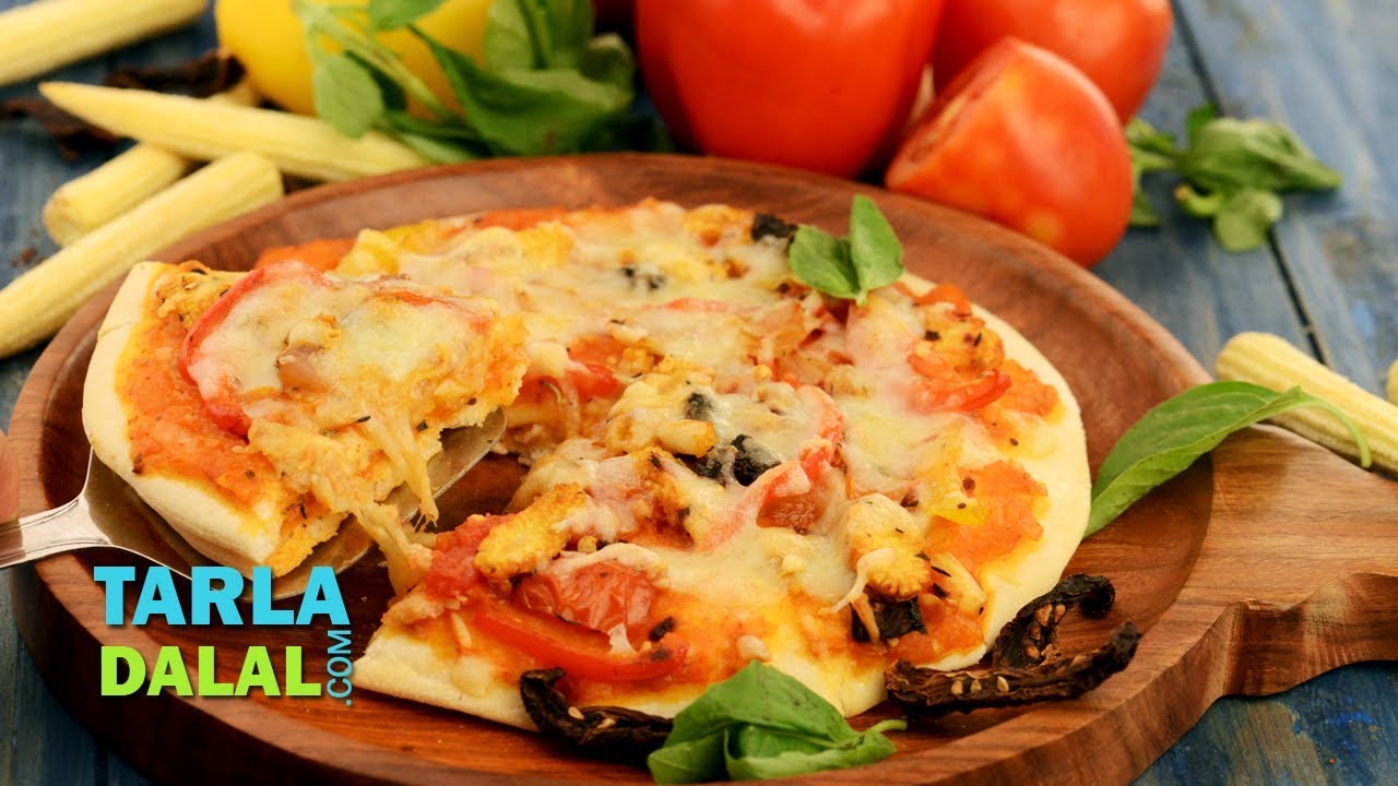 Double Layered Cheese Veggie Crunch Pizza by Tarla Dalal