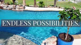Pool Construction built-in slide, grotto, tanning ledge (like a beach vacation)