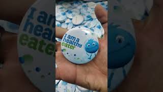 58mm badges contact 0304 2853425