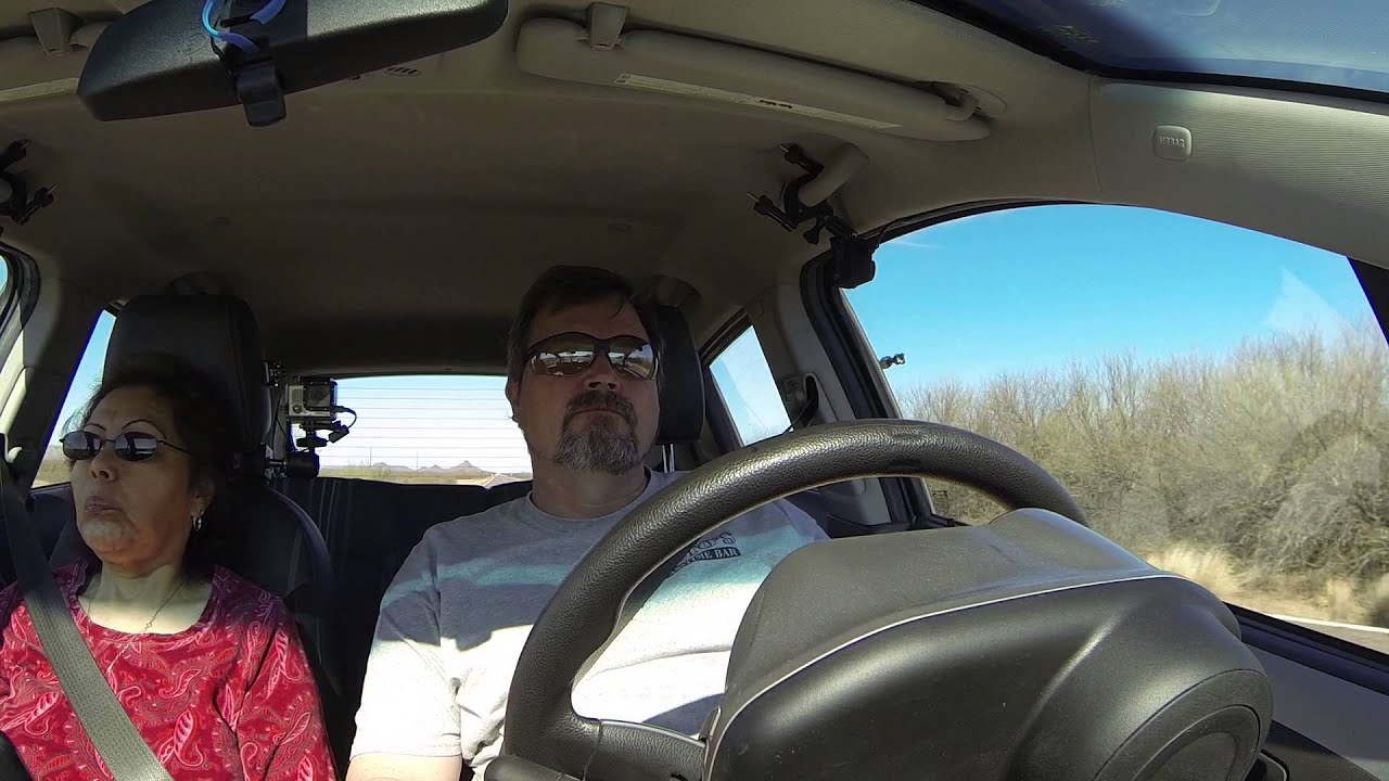 Late Night nipple Chewing? Yawning down Arizona State Route 86 past U.S. Border Patrol,  GP010831