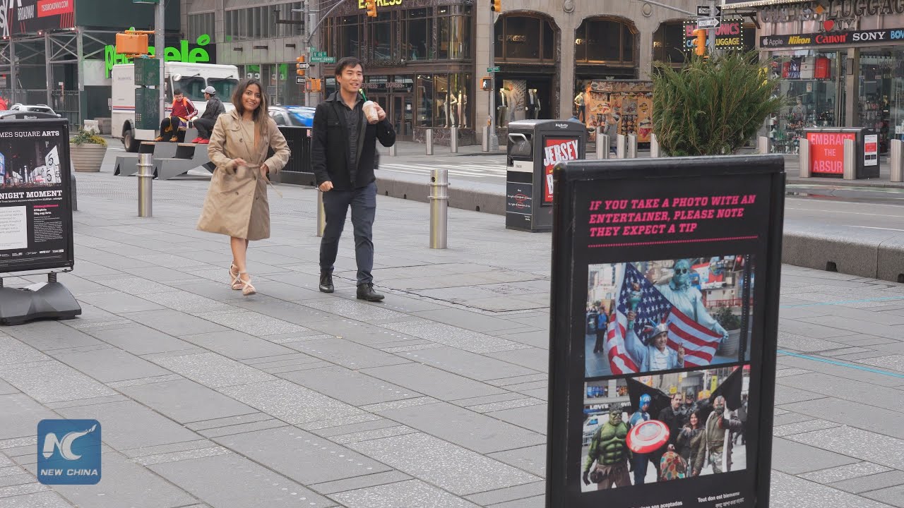 Few visitors seen in Times Square as coronavirus cases surge in NYC (4K Ultra HD)