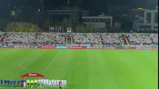 Every Kosovo fan holds up an England flag during the national anthem- ENGLAND VS KOSOVO 2019