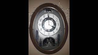 Cuorum Small World rhythm clock - YouTube