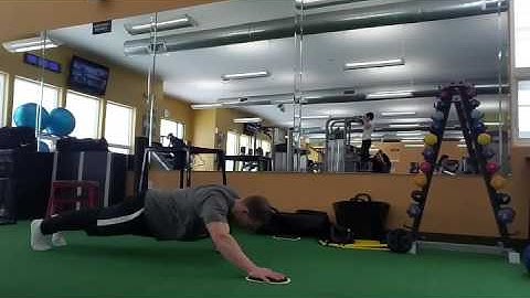 Valslide pushup w/ overhead reach