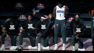 Jonathan Isaac stands alone during NBA national anthem cites religious