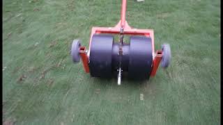 Effortless Lawn Aeration – Smooth Rolling Core Aerator in Action
