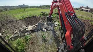 Moving concrete and grading with the Kubota KX 080 4