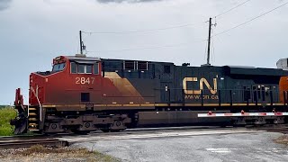 Westbound: CN 2847 (GE ES44AC) pulling autoracks | CN Kingston Sub | July 21, 2026