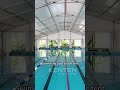 Swimming pool shade tent