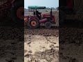 The process of plowing the land using a tractor with #youtubeshorts #automobile