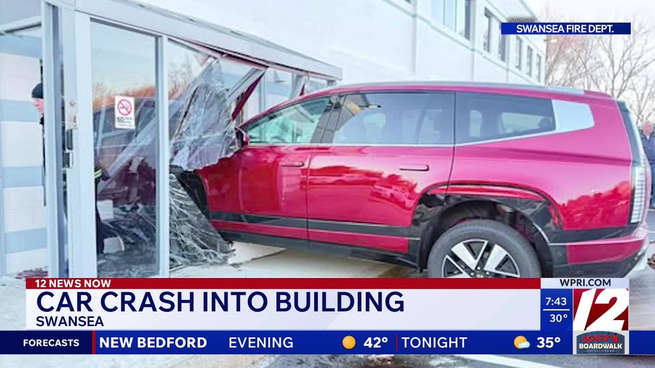 Car crashes into building in Swansea - YouTube
