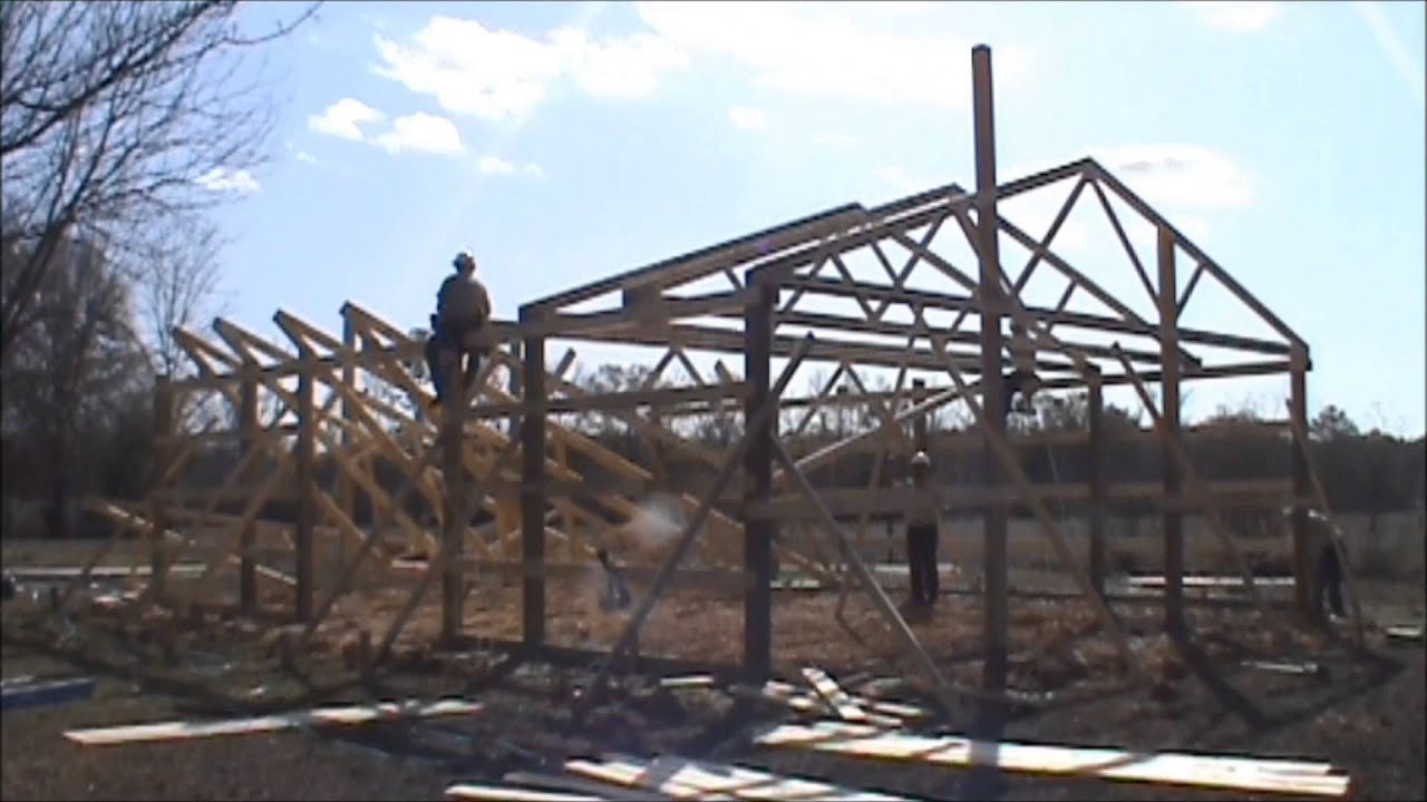 Five Starr metal builders framing a 30X40X10 pole barn 