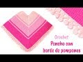 Poncho a crochet con borde de pompones