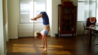 Handstand Scorpion demoed by teacher Kathryn Budig