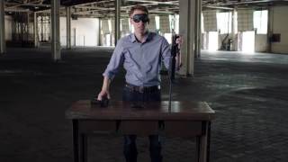 Democratic candidate Jason Kandor assembles assault rifle while blindfolded