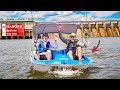 1v1 river fishing challenge in a tiny pedalboat big mistake