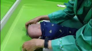 Fisioterapi BAyi Mengangkat Kepala saat Tengkurap