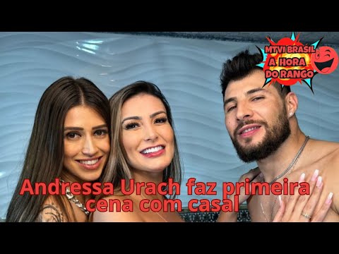 Andressa Urach faz primeira cena com casal e ensina