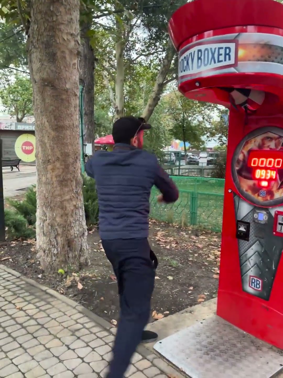 Drunk Man Almost Falls After Failing to Punch Boxing Arcade Machine