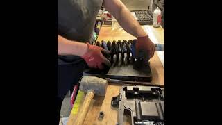 Coil Spring Compressor Legs Stuck After Attaching Spring To Shock Absorber