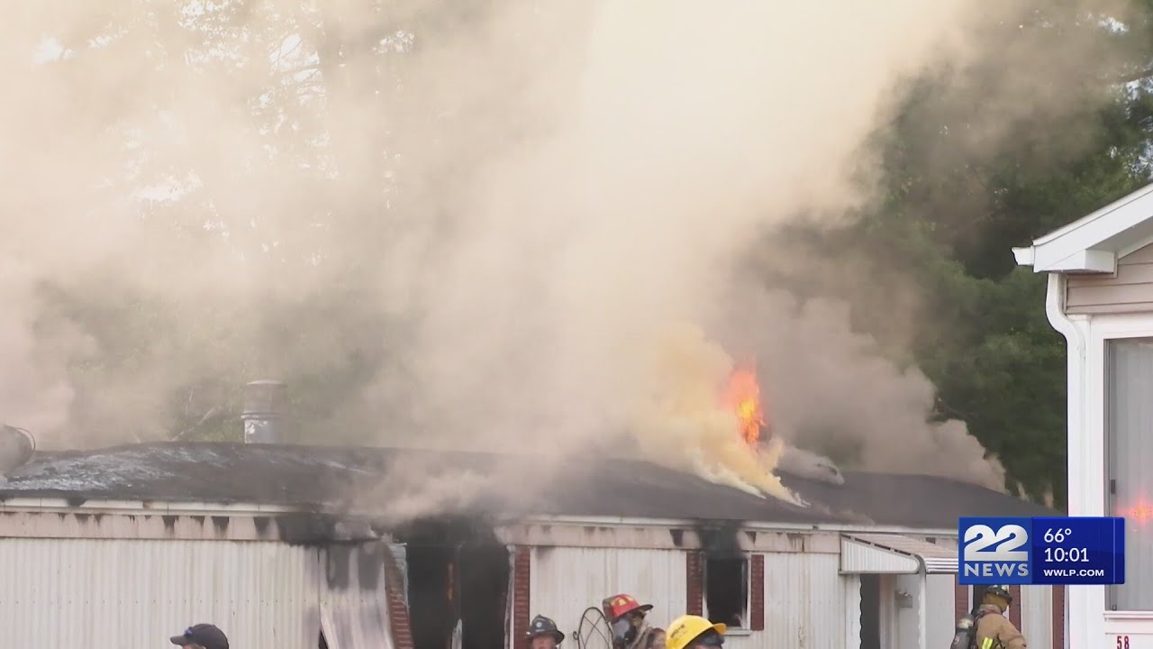 Multiple fire crews put out mobile home fire in Westfield - YouTube