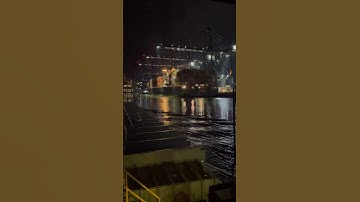 Container ship being unloaded.