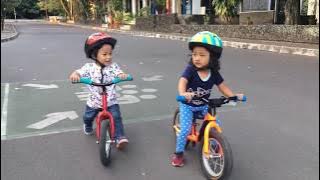 balance bike / push bike - toddler children playing together with their bike - belajar sepeda