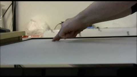 A Comparison of Direct and Indirect Multi-Touch Input for Large Surfaces