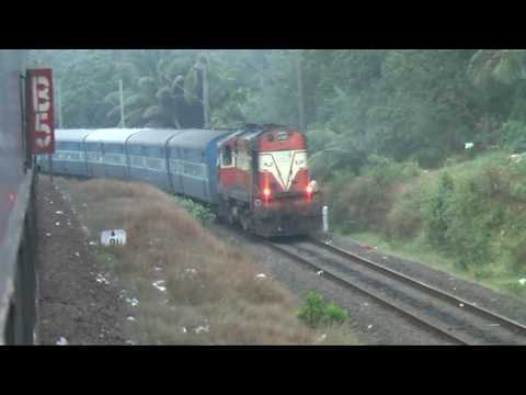 Enjoy this late-evening throbbing Alco! Having pulled out of Shoranur, ERS WDM2 16459 powers up after crossing Bharathapuzha River toward Kochi. I was in 262...
