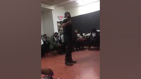 J.R. Morris sharing a very painful poem with students