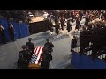 See opening processional of memorial service for fallen police officer, Natalie Corona