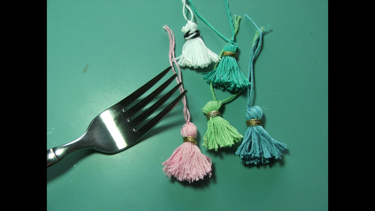 Tiny tassels made with a fork???? huh??